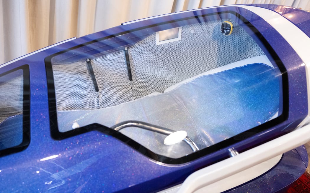(FILES) This photograph shows a view of the Sarco assisted suicide capsule, during a press conference organised by the 
