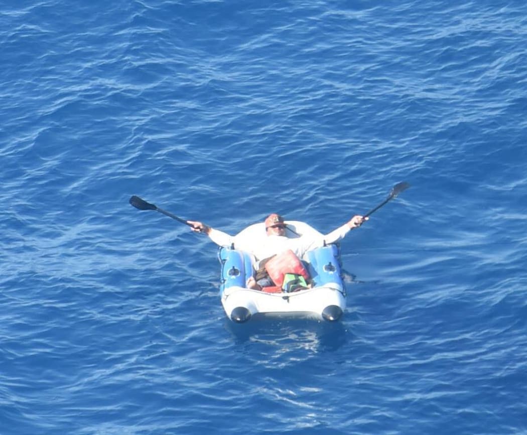 The missing fisherman was found off the coast of Tonga waving his paddles.