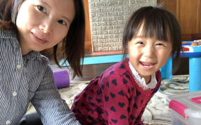 Lily Gao and her daughter Elysse. Gao says she's enjoying spending lots of time with her family during quarantine or lockdown both in Wuhan and Auckland.