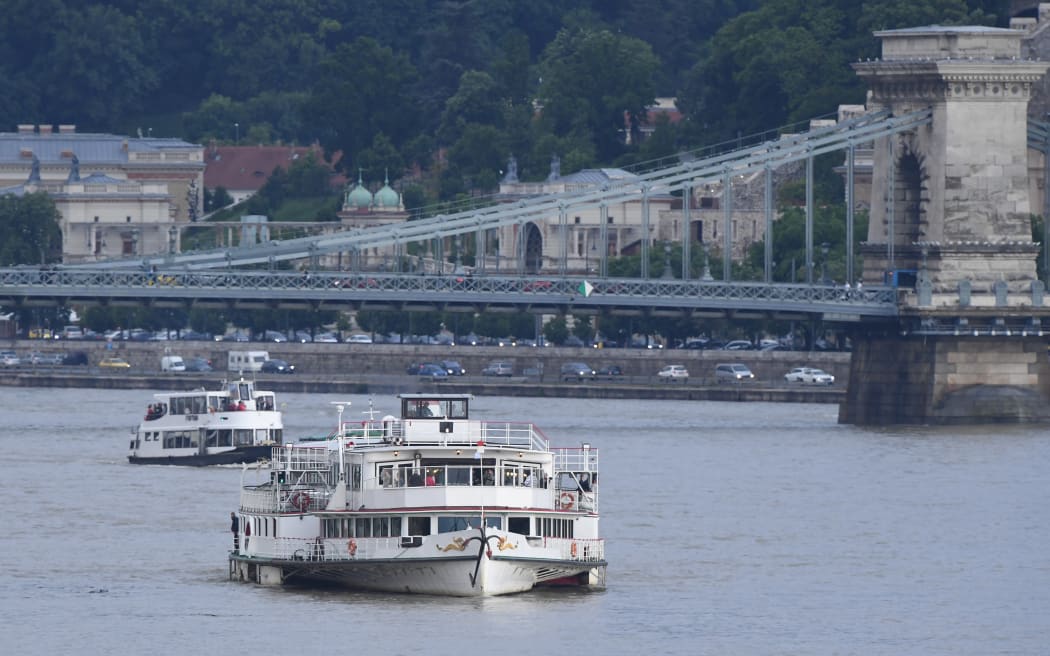 Sightseeing cruises are seen on the Danube river.