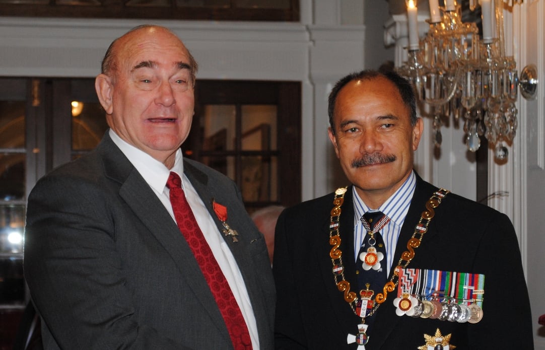 Dr Guy Jansen (left) receiving his MNZM in 2012 for services to music