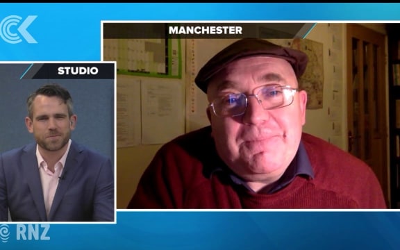 Manchester man stands outside local mosque in display of unity