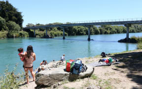 Swimmers at Ferry Bridge in 2018. The popular swimming spot is to be closed until June 2027.