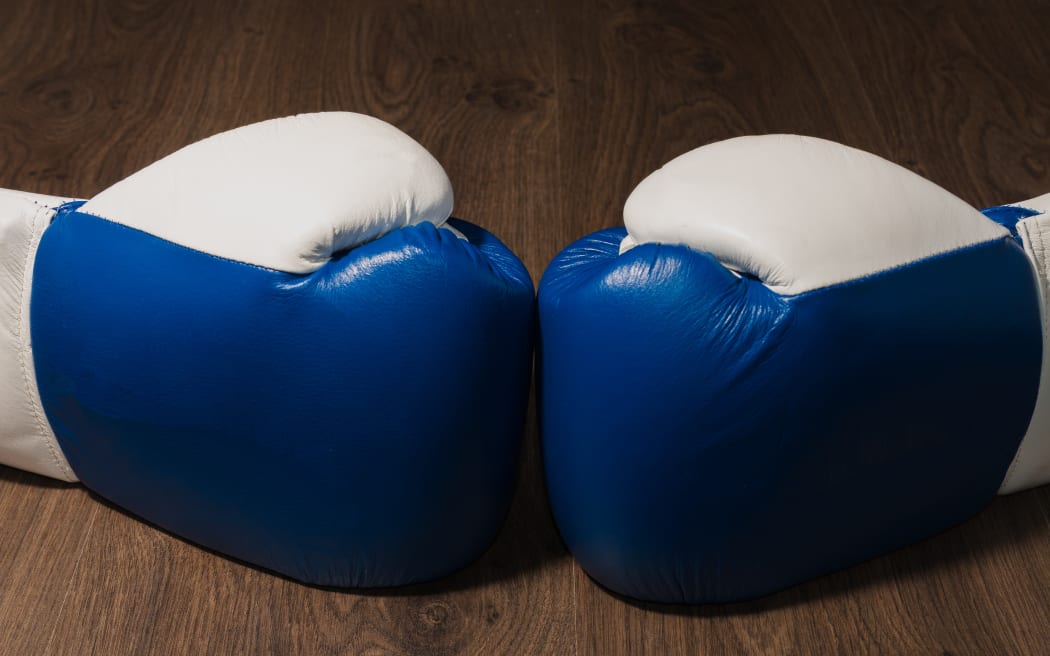 Boxer's professional outfit on a wooden background.
