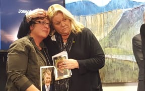 Anna Osborne, left, and Sonya Rockhouse were among family members at the signing of today's agreement