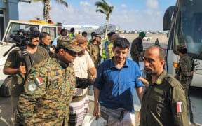 Yemeni Huthi rebel prisoners are released during a prisoner exchange with the internationally recognised-government, on their way to board a flight to the Huthi-held capital Sanaa, from the country's southern city of Aden on April 14, 2023.