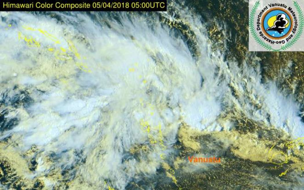 The system TD13F above Vanuatu on Thursday. Fiji's meteorological service said it would likely develop into a cyclone as it neared there by Sunday.