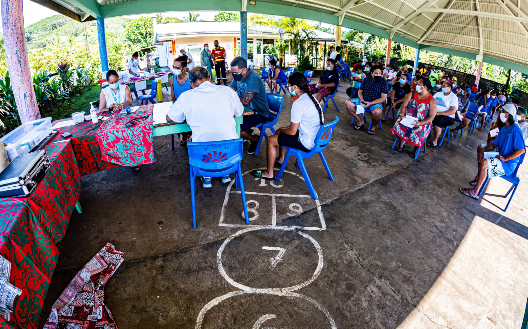 Residents of the municipality of Hitiaa wait to be vaccinated at the Covid-19 vaccination center opened in a school, in  Hitiaa, on the French Polynesia island of Tahiti, on September 8, 2021. (Photo by Jerome BROUILLET / AFP)