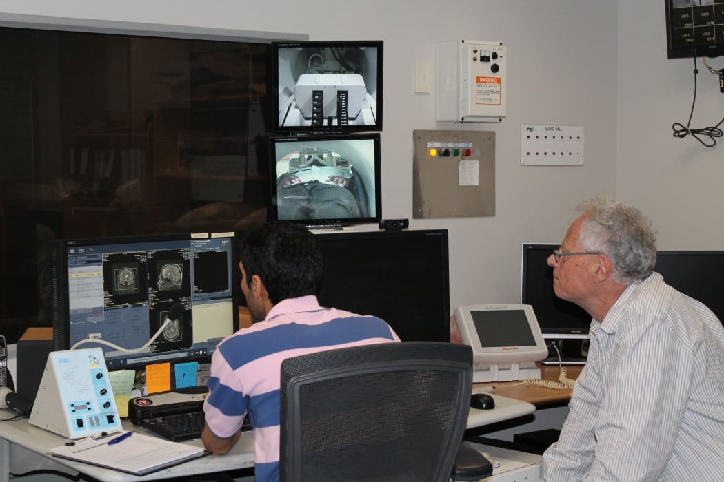 Ruben Gur and Christchurch PhD student, Mustafa Almuqbel, view images from the MRI scanner.