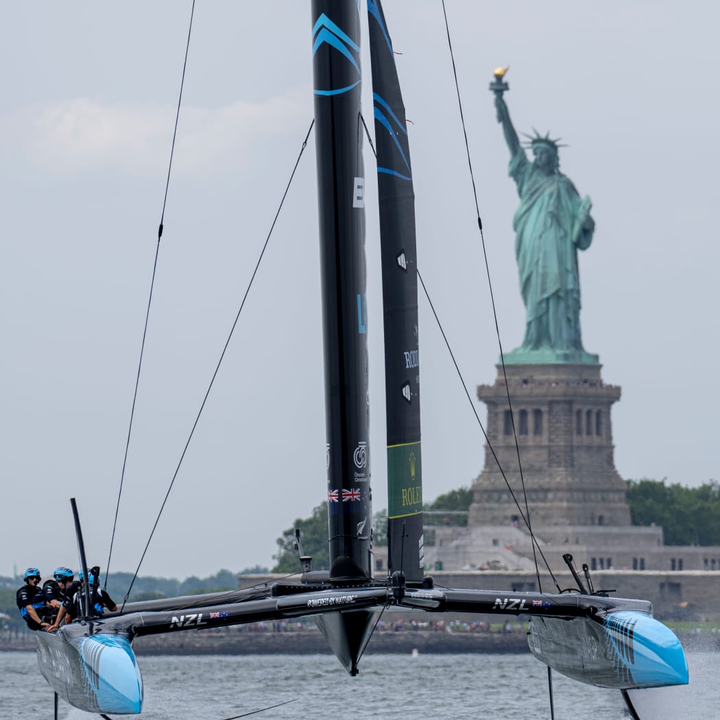 New Zealand SailGP Team pass the Statue of Liberty at the New York Sail Grand Prix in New York, USA.