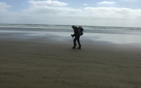 An image of a fellow trail walker in the distance on 90 Mile Beach.