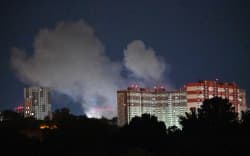 Smoke from an explosion rises during a Russian missile strike on the Ukrainian capital of Kyiv on July 6, 2026, amid the Russian invasion in Ukraine. Russian strikes on Kyiv killed three people on July 6, authorities said, the second deadly attack on the Ukrainian capital in less than a week. (Photo by Sergei SUPINSKY / AFP)