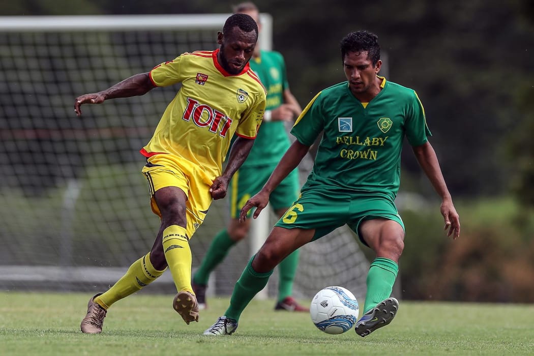 Nigel Dabinyaba (L) scored twice as the PNG champions fought back to earn a draw.