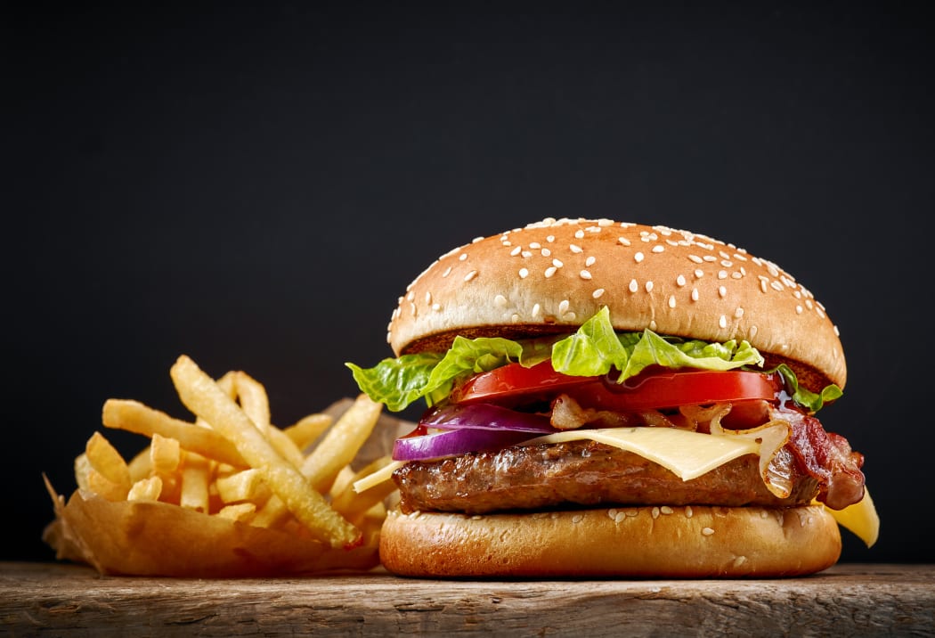 Burger with fries.
