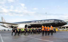 On the tarmac Air NZ staff perform a special haka for the departing All Blacks.