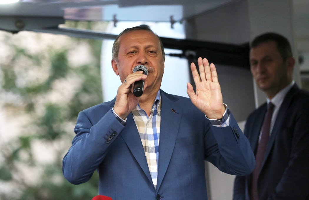 Turkish President Recep Tayyip Erdogan addresses supporters in Istanbul after the failed coup attempt.