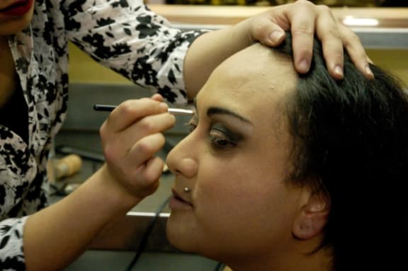 Moe Laga's makeup is done in Te Puke Otara community hall's kitchen