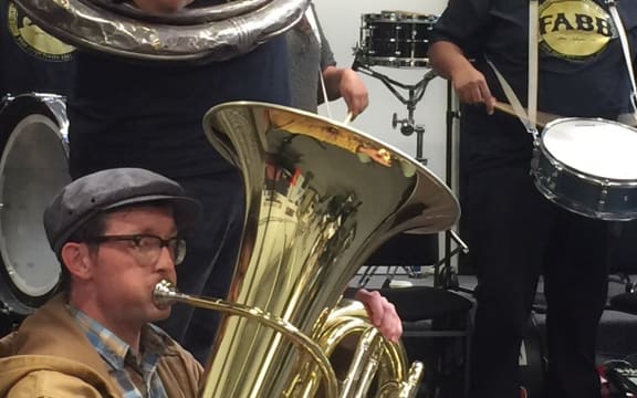 Free Agents' John Cannon (sousaphone) and Floyd Green (snare drum) with Wellington tuba player Dan Yeabsley at workshop