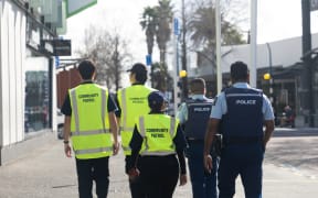 Volunteers from the Tāmaki Makaurau Safety Patrol Group are patrolling the streets with the police.