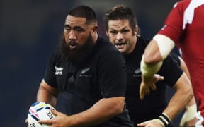 Charlie Faumuina on the charge against Georgia, supported by Richie McCaw