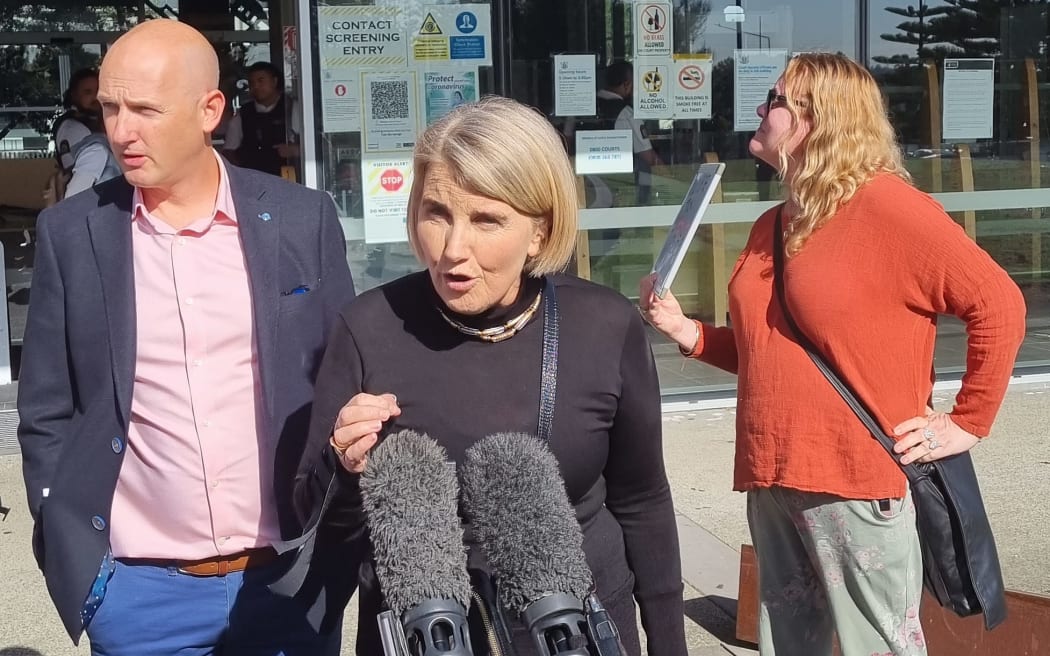 Former broadcaster and anti-vaccine campaigner Liz Gunn addresses supporters outside Manukau District Court on 23 March, 2023, where she pleaded not guilty to charges of assault, resisting arrest, and trespassing, after attempting to film an on-camera interview at Auckland Airport in February.
