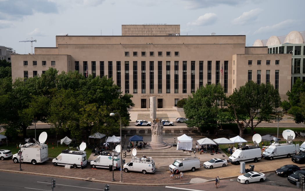 Members of the media outside the Barrett Prettyman Courthouse, in Washington, DC, on August 1, 2023. In a major development in the documents probe on July 27, 2023, Special Counsel Jack Smith alleged that Trump, who is scheduled to go on trial at the height of the campaign in March and May next year, asked a worker at his beachfront estate in Florida to delete surveillance footage to obstruct investigators. (Photo by Stefani Reynolds / AFP)