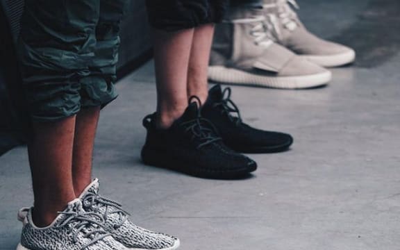 three pairs of sneakers