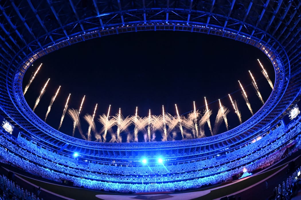Fireworks go off around the Olympic Stadium during the closing ceremony of the Tokyo 2020 Olympic Games, in Tokyo.