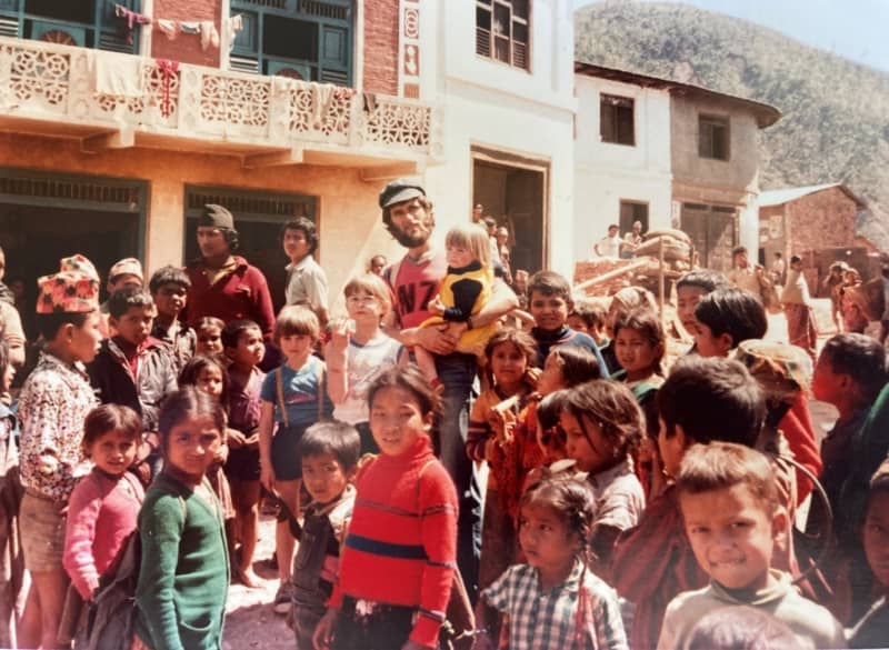 Greg Judkins with village children in Nepal.