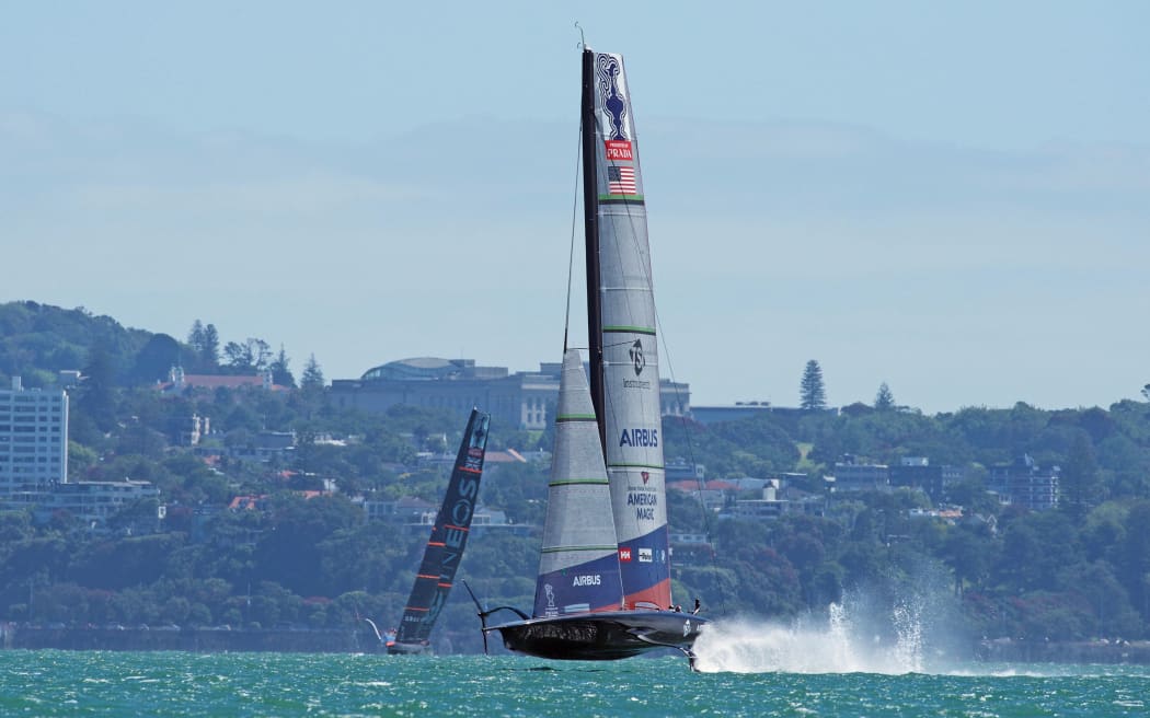 American Magic with INEOS Team UK in background.