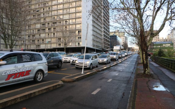 Traffic backed up on Nelson St in Auckland after Victoria Street was closed when a panel fell of a building.
