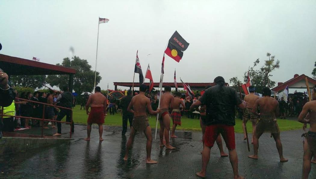 About 200 anti-TPP protesters are welcomed onto Te Tii Marae in Waitangi.