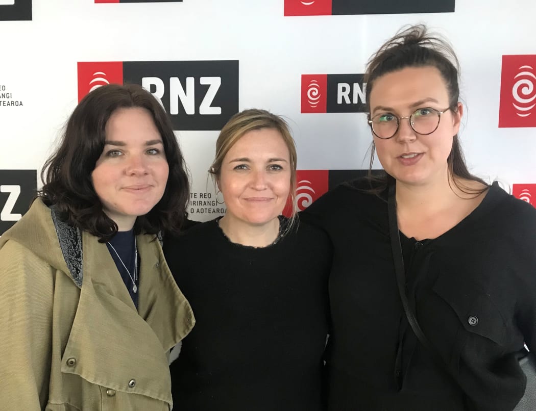 Music 101 host Cahrlotte Rayn posing with Nadia Reid and Hollie Fullbrook of Tiny Ruins'