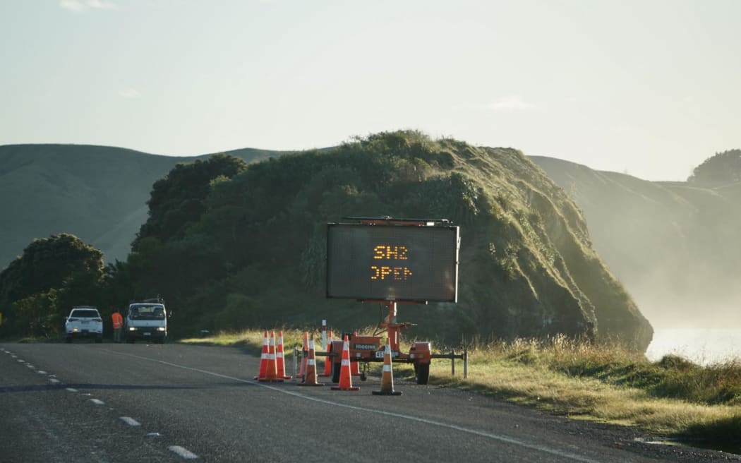 A road sign reading: State Highway 2 open