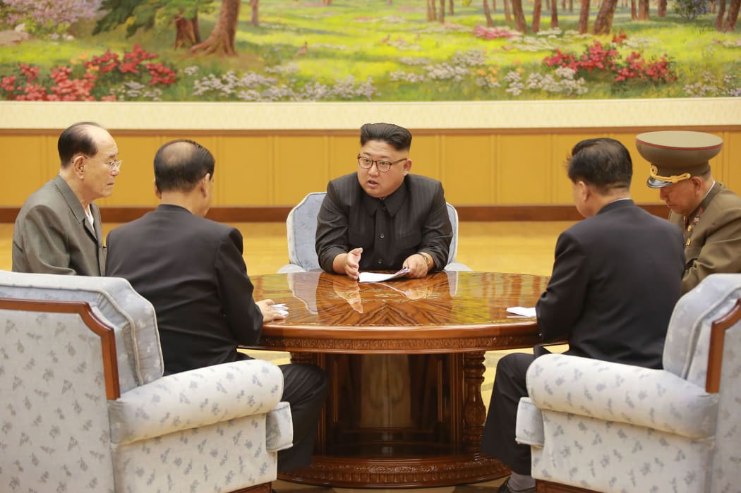 North Korean leader Kim Jong-un, centre, meeting members of the Workers' Party of Korea. Image released by  official Korean Central News Agency (KCNA) on 4 September.