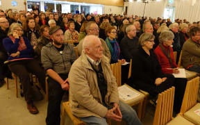 About 300 people with repairs they say have been botched turned up to the meeting.