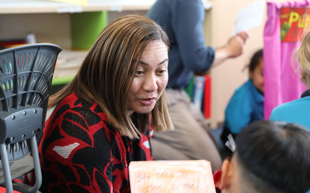 Marama Davidson chats with pupils at Hay Park School in Auckland as the party announces a free lunch in schools policy on the campaign trail.