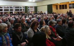 Katikati residents crowded the town hall for a meeting about the state highway running through the town.