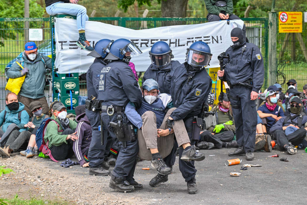 Protesters attempt to storm Germany's Tesla factory | RNZ News