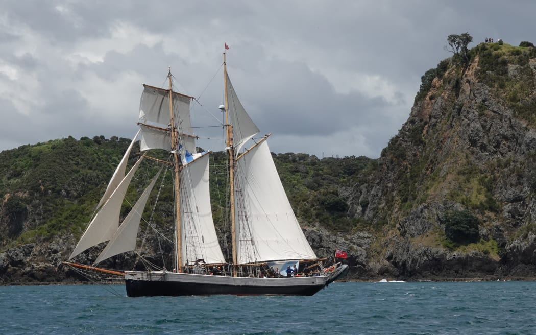 The R Tucker Thompson passes spectators atop Tapeka Point.