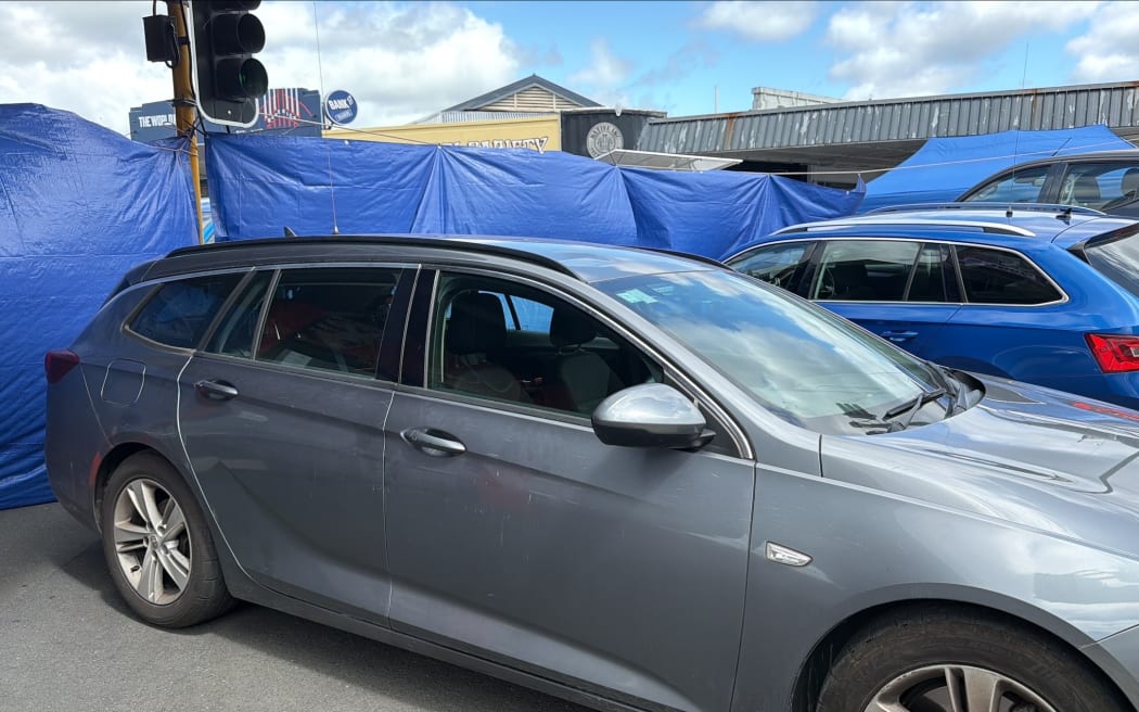 Police tarpaulin at the scene of an 'unexplained' death on Bank Street in central Whangārei.