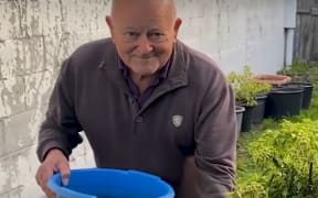 A gardener in the Magic Beans promo video