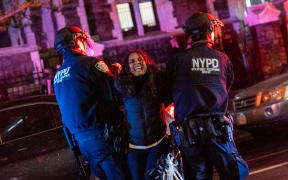 Police arrest protesters during pro-Palestinian demonstrations at The City College Of New York (CUNY) as the NYPD cracks down on protest camps at both Columbia University and CCNY on 30 April, 2024 in New York City.