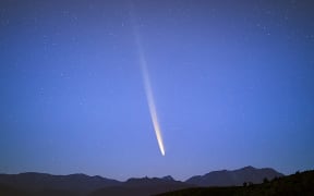 Comet C/2023 A3 (Tsuchinshan–ATLAS) in the dawn sky over the U.S. National Science Foundation Cerro Tololo Inter-American Observatory.