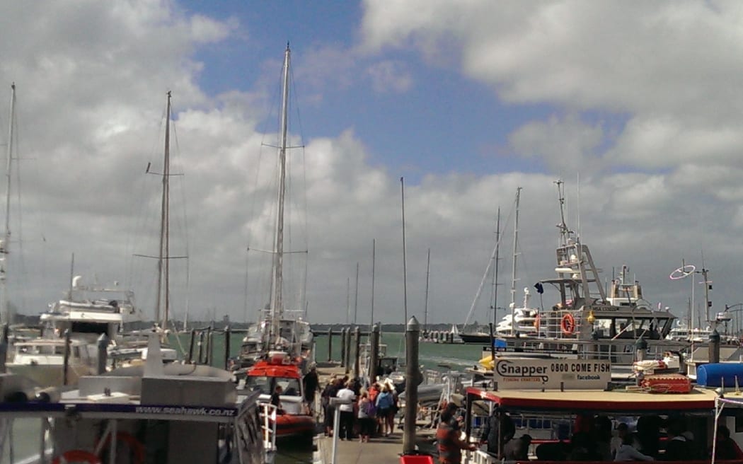 People coming off the police vessel.