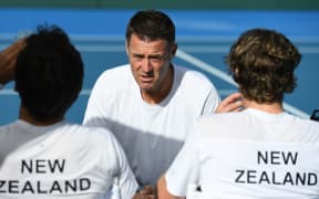 New Zealand non-playing captain Alistair Hunt talks to his doubles players Marcus Daniell and Artem Sitak. Davis Cup tie 2017.