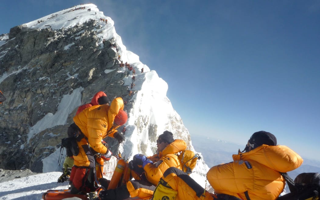 A group of mountaineers approach the Hillary Step in May 2009.