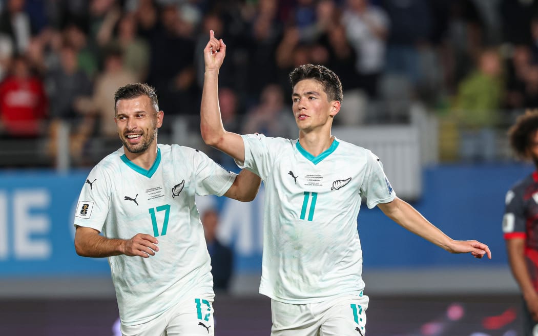 New Zealand's Elijah Just scores and celebrates his goal with Kosta Barbarouses, 2025.