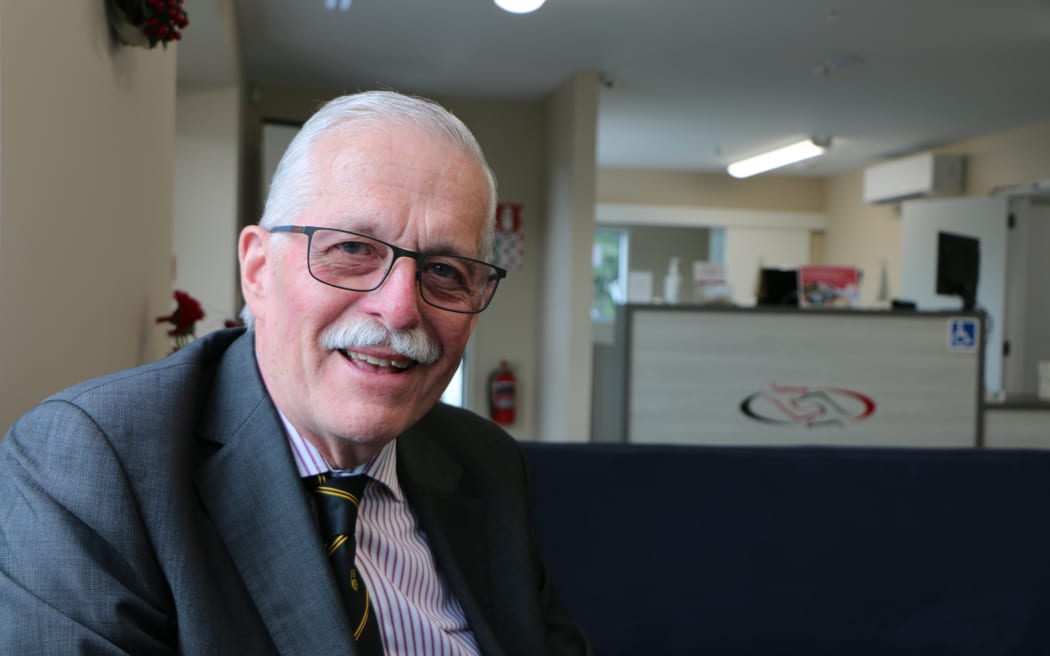 Phil Bagshaw is sitting in the new reception area.