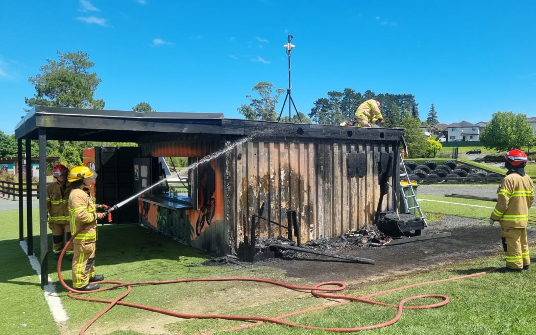 Police said emergency services were called to the blaze at Waitākere BMX club on Glen Road in Rānui just before 2pm on Monday. The club has posted photos of the canteen on Facebook, which show the standalone container-like structure blackened inside and out.